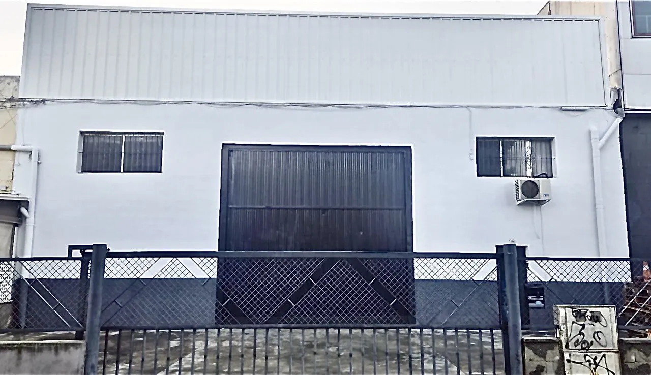 Pintura de fachada de nave en Alicante — pintura industrial Costa Blanca
